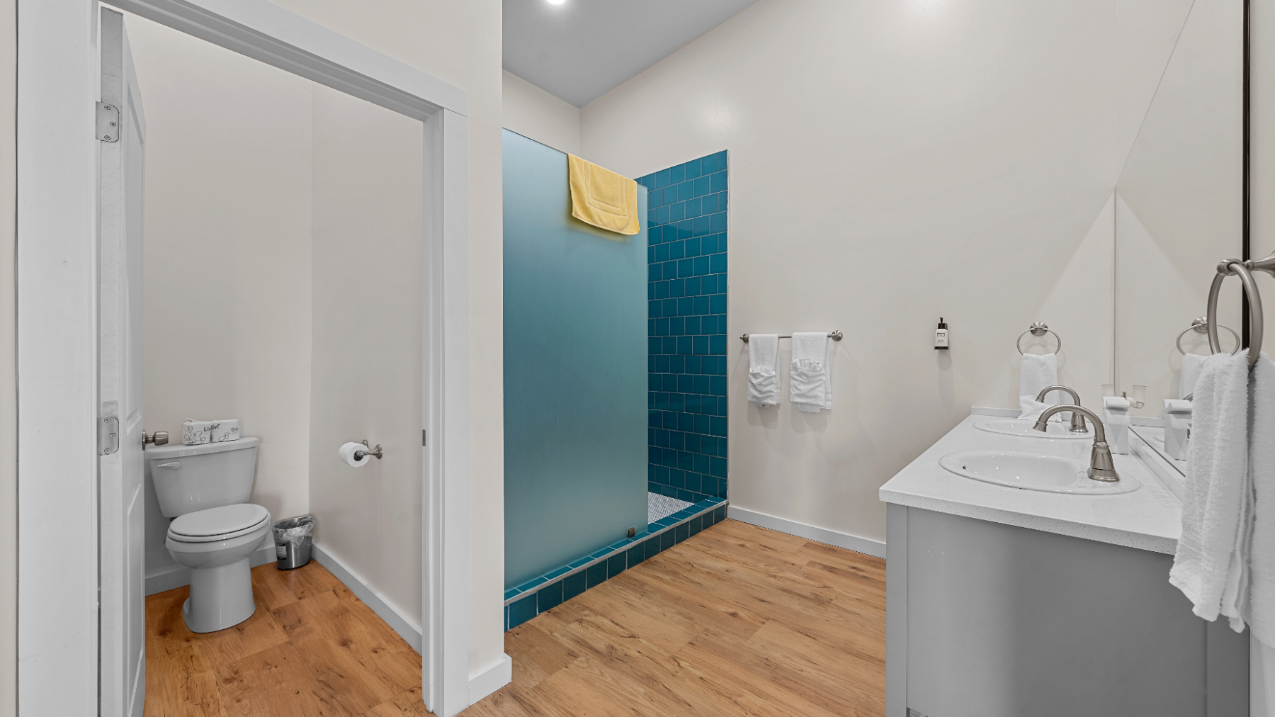 a room with a sink and a mirror