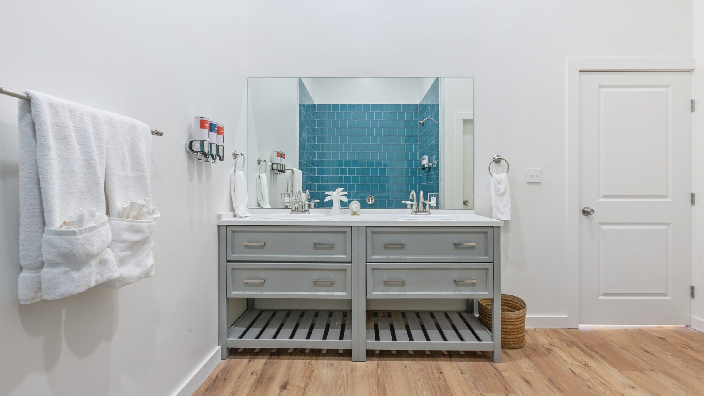 a bedroom with a wooden floor