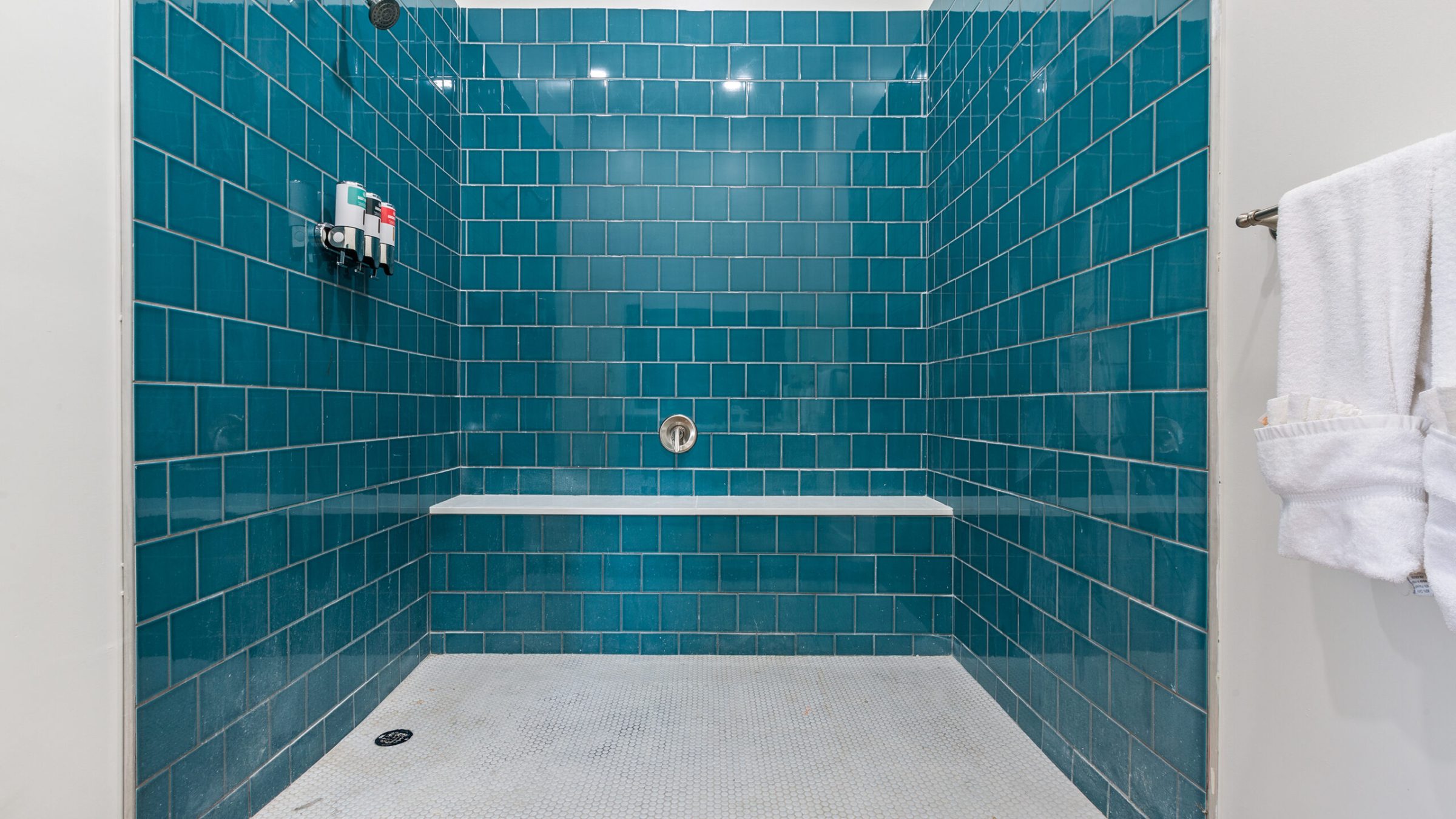 a blue tiled wall