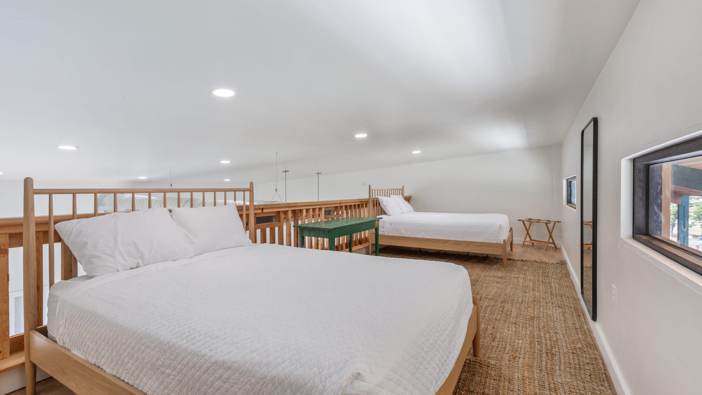 a bedroom with a large bed in a room