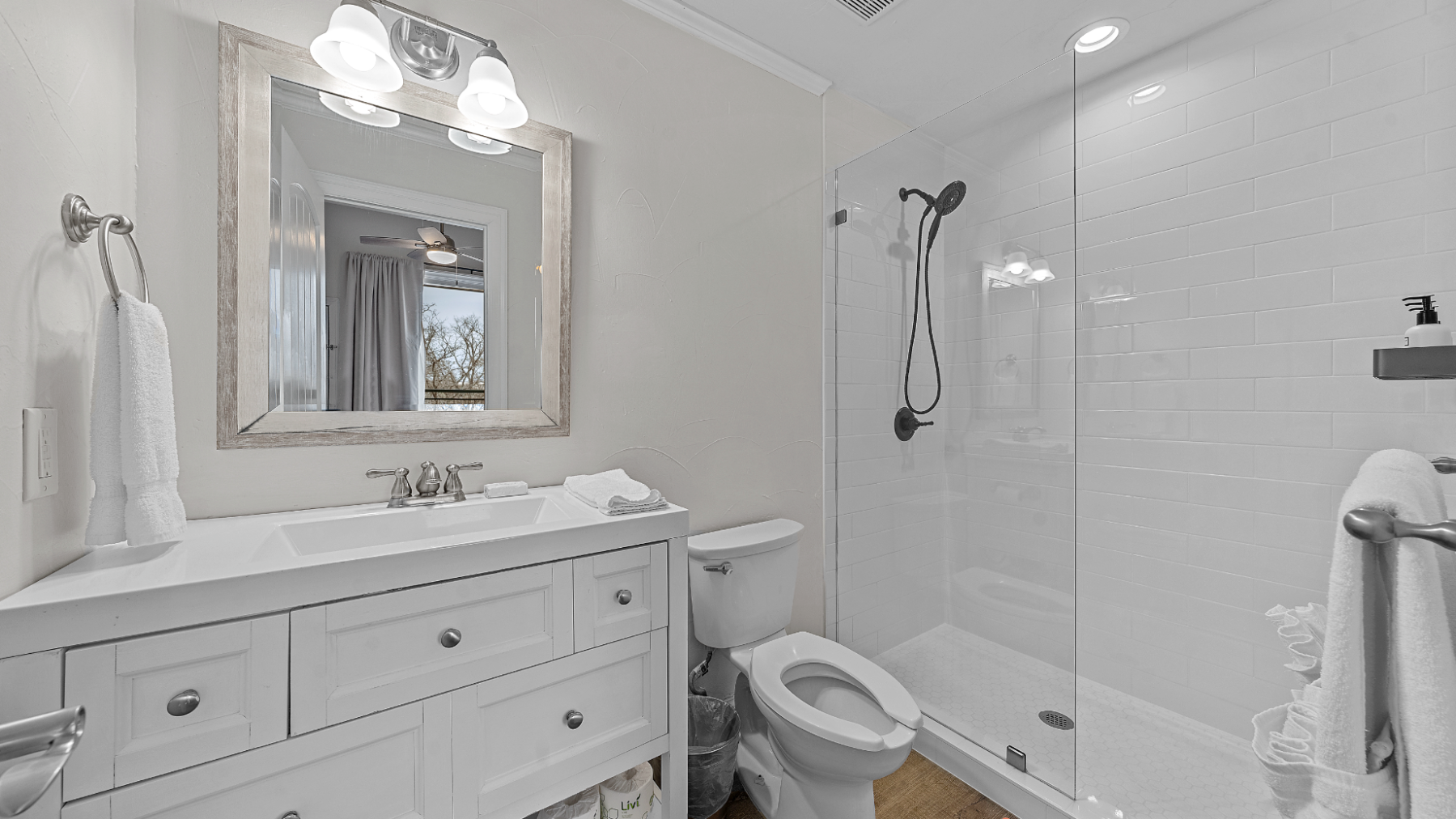 a room with a sink and a mirror