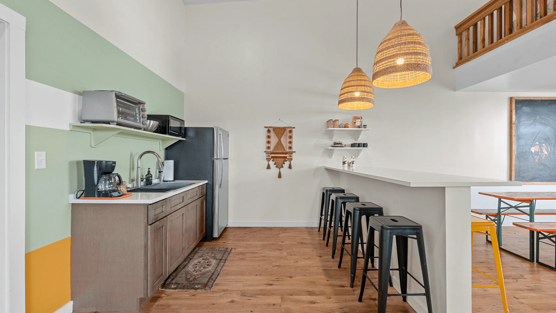 a kitchen filled with lots of furniture