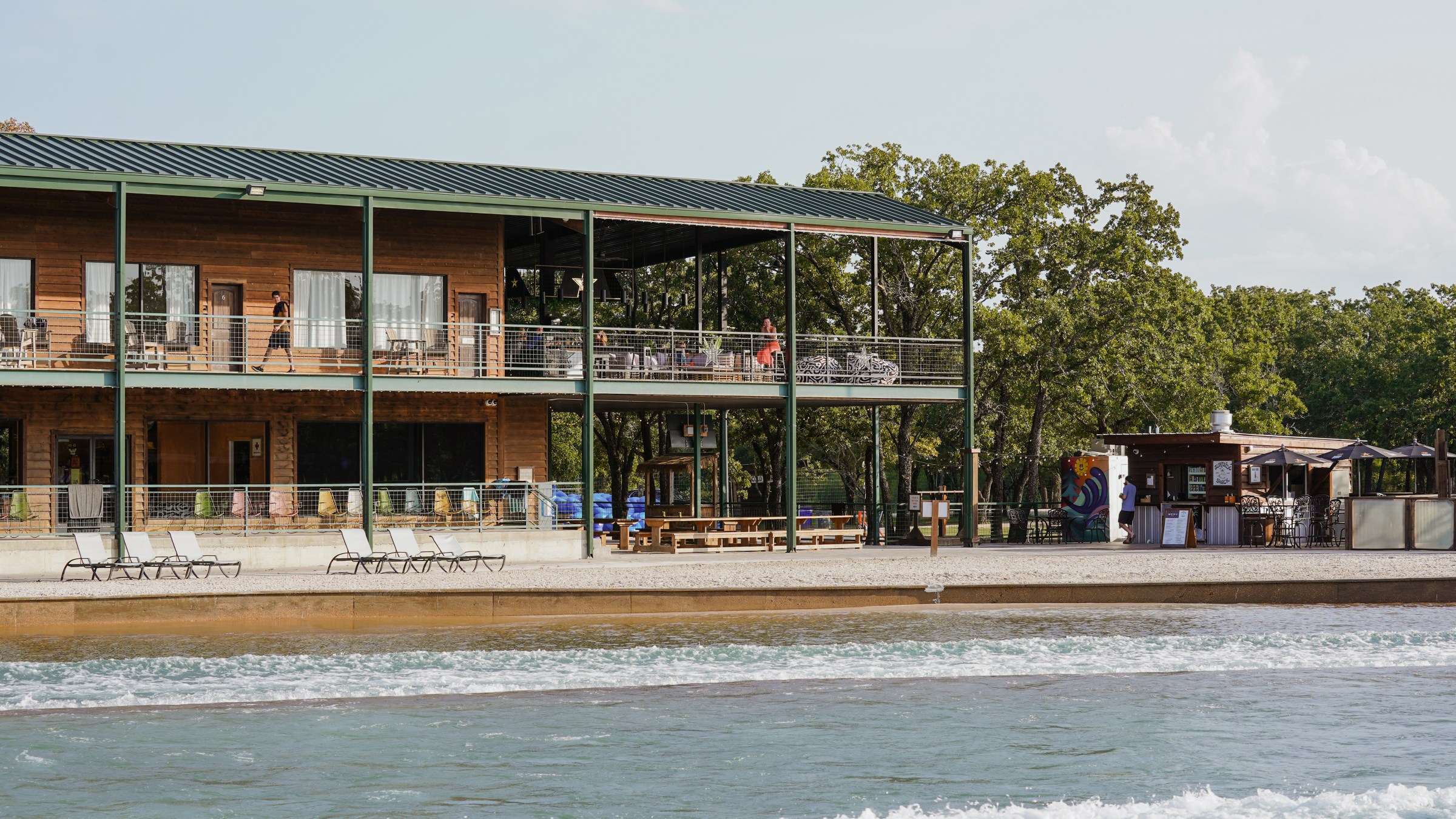 Waco Surf Hotel overlooking the surf lagoon, a lodging option at Waco Surf