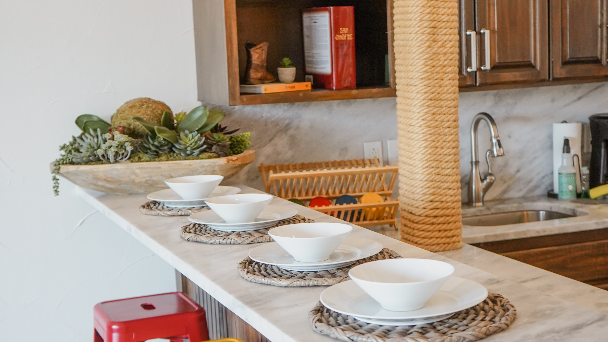 The Malibu Suite living kitchen and dining area, a lodging option at Waco Surf