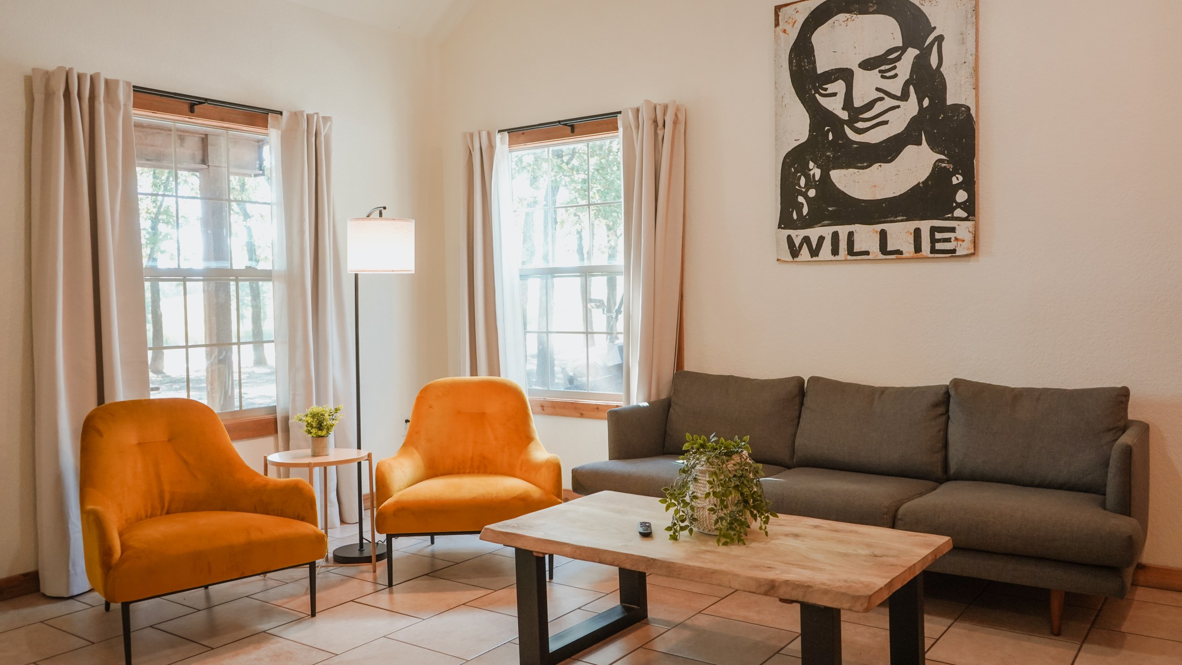 Standard cabin living room space, a lodging option at Waco Surf