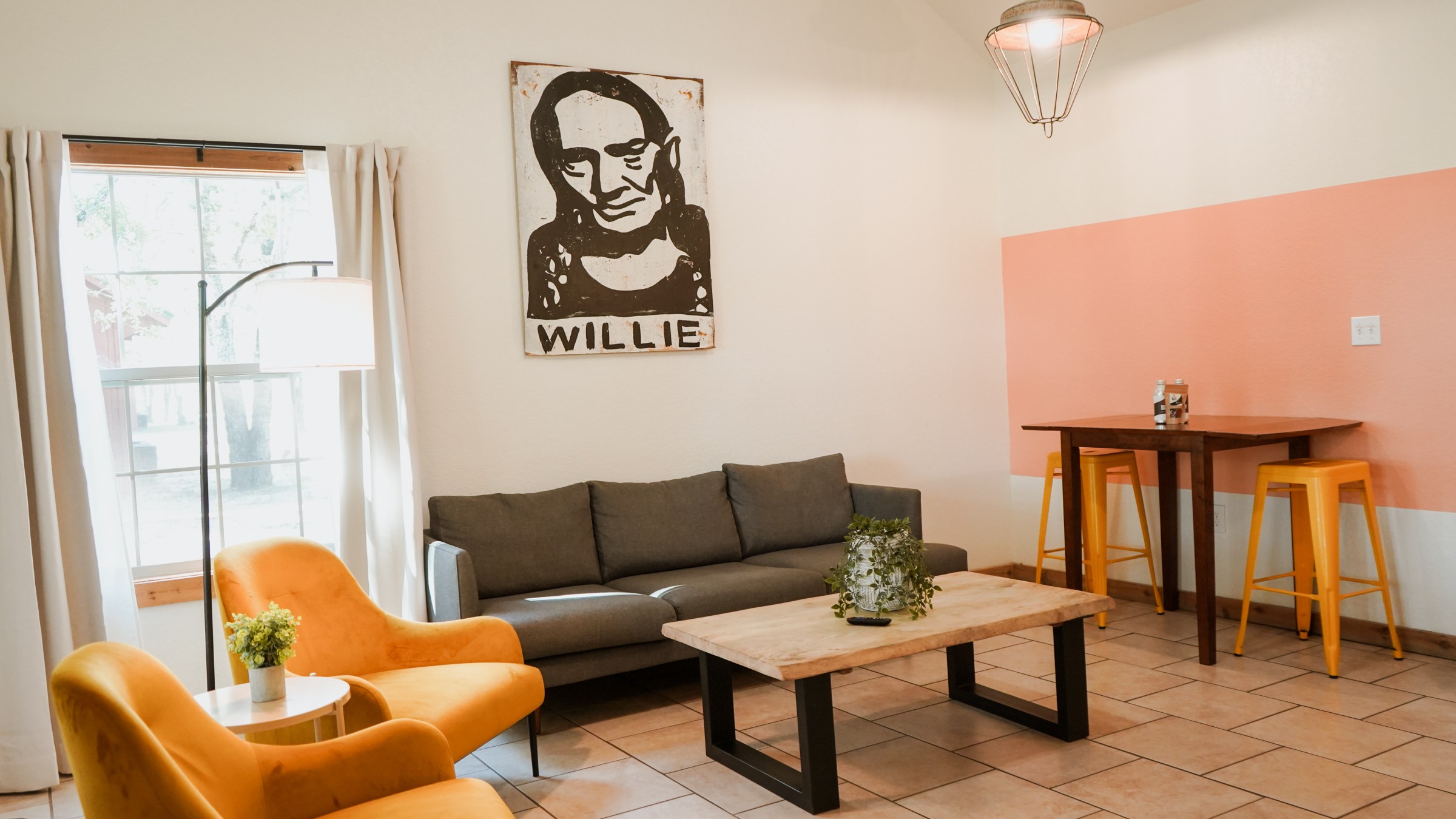 Standard cabin living room space, a lodging option at Waco Surf