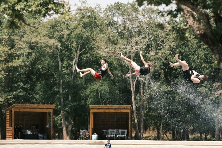 a group of kids going off the Wedge Slides
